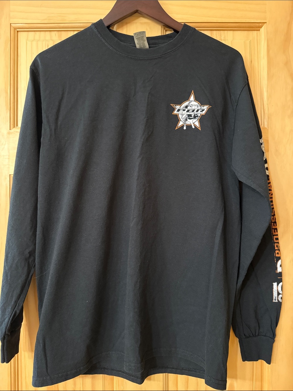 Gildan Black Tee with White and Orange Star Bull Graphic